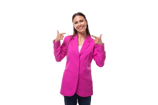 young energetic charismatic assistant woman with black flowing hair is dressed in a crimson jacket.