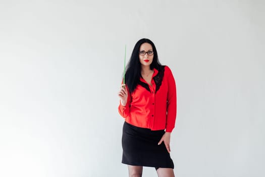 business woman teacher in red clothes