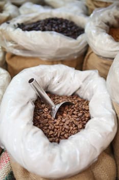 fresh coffee beans selling at Istanbul street in a jar .