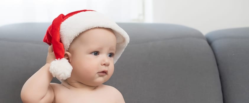 Christmas little baby boy, baby in santa hat