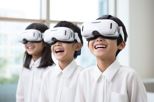 Asian children in white shirts at school during a lesson wearing virtual reality glasses. New technologies in training.