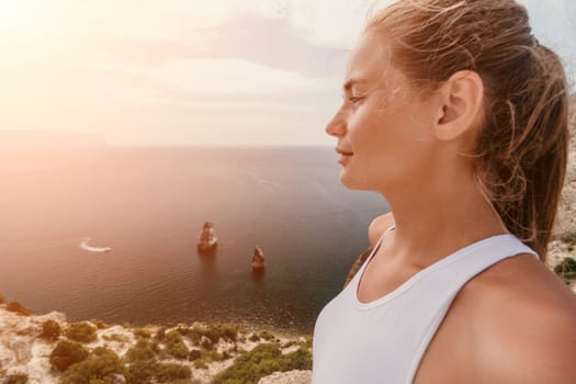 Woman travel sea. Happy tourist in hat enjoy taking picture outdoors for memories. Woman traveler posing on the beach at sea surrounded by volcanic mountains, sharing travel adventure journey