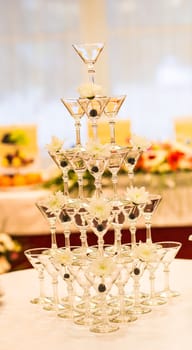 Celebration. Pyramid of champagne glasses. alcohol for a festive reception