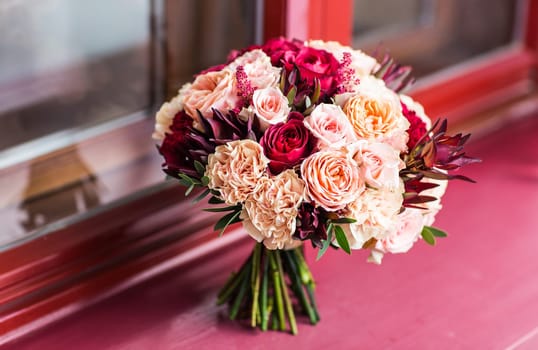 Wedding bouquet close-up. Bridal fresh bouquet, wedding flowers