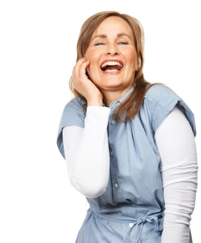 Comic, happy and portrait of woman in a studio for funny and silly joke in conversation. Smile, excited and confident mature female model with goofy face expression isolated by white background