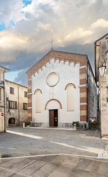 Portobuffolè, Italy. November 9, 2023. facade of the medieval church in the city center