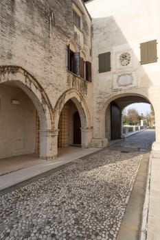 Portobuffolè, Italy. November 9, 2023. The medieval gate called Friuli surmounted by Toresin, 10th - 11th century