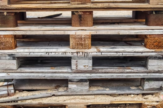Close up view of a stack of wooden pallets