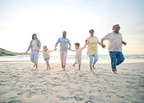 Trust, family and walking with holding hands on beach with freedom with care on vacation with sunshine. Love, children and generations or parents at ocean together for travel with bonding in summer