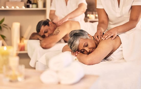 Relax, hands and an old couple at the spa for a massage together for peace, wellness or bonding. Luxury, treatment or body care with a senior woman and man in a beauty salon for physical therapy.