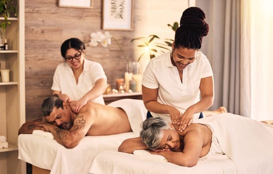 Relax, happy and an old couple at the spa for a massage together for peace, wellness or bonding. Luxury, hospitality or body care with a senior woman and man in a beauty salon for physical therapy.