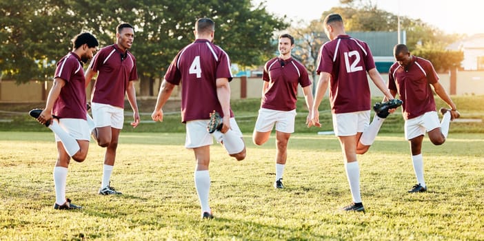 Rugby, sports and stretching with a team getting ready for training or a competitive game on a field. Fitness, sport and warm up with a man athlete group in preparation of a match outdoor in summer.