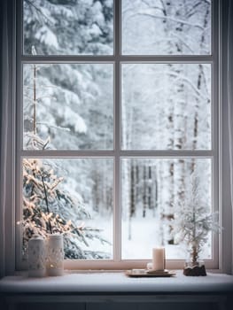 View through the window of a cottage into a snow-covered winter forest