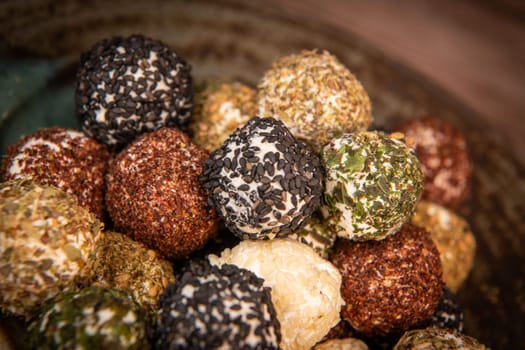 RECIPE FOR LABNEH CHEESE BOLLS WITH DRIED MINT, WHITE AND BLACK SESAME, SUMAC AND ZAATAR. High quality photo