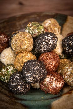 RECIPE FOR LABNEH CHEESE BOLLS WITH DRIED MINT, WHITE AND BLACK SESAME, SUMAC AND ZAATAR. High quality photo