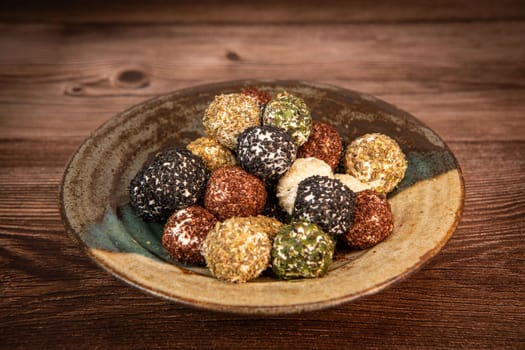 RECIPE FOR LABNEH CHEESE BOLLS WITH DRIED MINT, WHITE AND BLACK SESAME, SUMAC AND ZAATAR. High quality photo