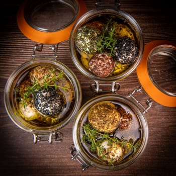 RECIPE FOR LABNEH CHEESE BOLLS WITH DRY MINT, BLACK AND WHITE SESAME, SUMAC AND ZAATAR IN A JAR WITH OLIVE OIL. High quality photo