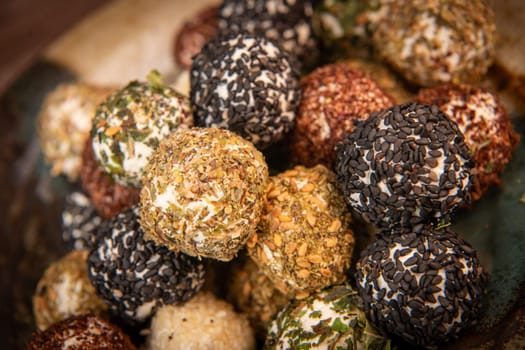 RECIPE FOR LABNEH CHEESE BOLLS WITH DRIED MINT, WHITE AND BLACK SESAME, SUMAC AND ZAATAR. High quality photo