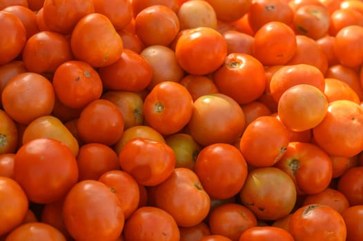 Appetizing tomatoes at the market on the island of Cyprus in autumn
