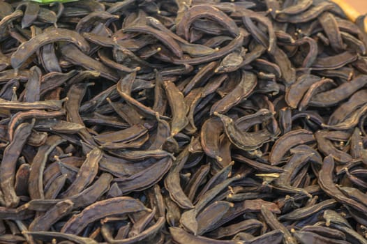 dry carob at the bazaar on the island of Cyprus in autumn