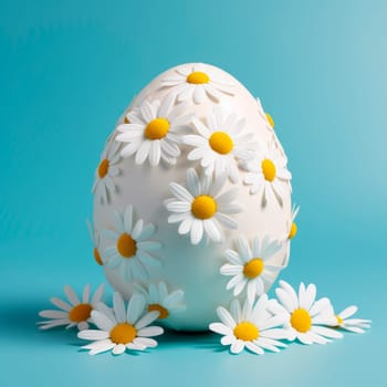 Easter creative composition with Easter egg and daisies. High quality photo