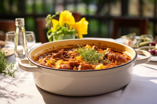 Cassoeula, traditional Lombardy dish with a stew made with pork meat and cabbage, often served with polenta. Italian seasonal comfort dish.