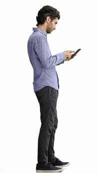 young man in full growth. isolated on white background taking selfie.