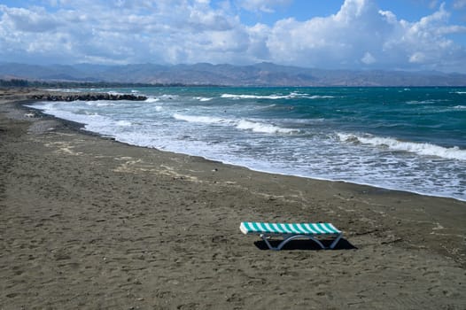 sun lounger on the Mediterranean beach on a sunny day