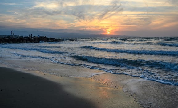 shore of the Mediterranean sea autumn 2023 in the setting sun 8