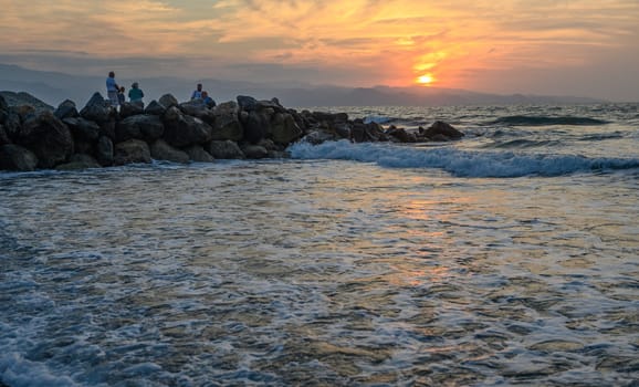 shore of the Mediterranean sea autumn 2023 in the setting sun 9