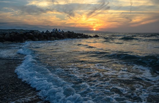 shore of the Mediterranean sea autumn 2023 in the setting sun 17