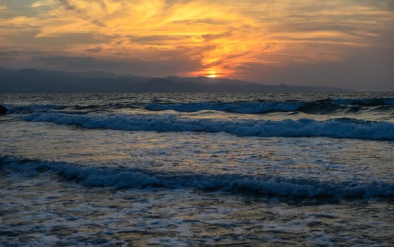 shore of the Mediterranean sea autumn 2023 in the setting sun 18