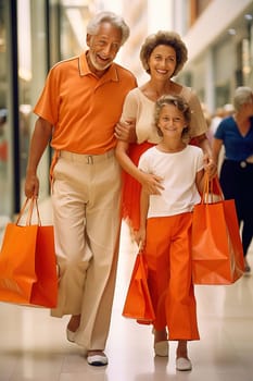 An adult happy man with his family walks around the store with purchases. High quality photo