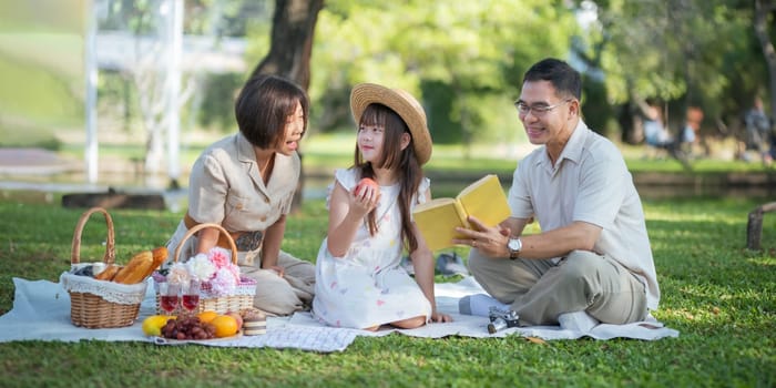 Grandparent playing togetherness with a granddaughter in the park in the morning. Family, love and grandchild bonding with grandfather and grandma in a park. concept child and senior.