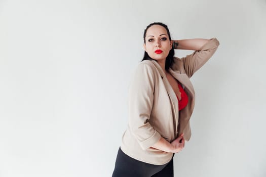 a brunette woman with open neckline on white background