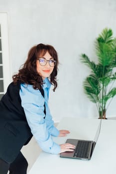 a conversation online communication remote work woman with laptop computer internet communication