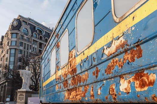 A shelled evacuation wagon is seen on Mykhailivska Square in Kyiv