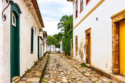 Old street with historic colonial-style houses and cobblestones in the famous city of Paraty in the state of Rio de Janeiro