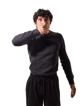 A man covering his mouth with his hands. A Man's Surprise and Shock Concealed Behind His Hands