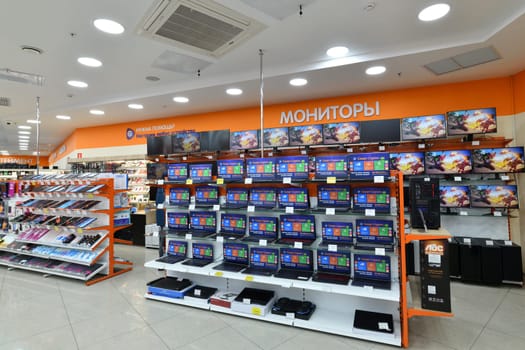 Moscow, Russia - Nov 11. 2023. Laptop,monitors and tablets in DNS network store selling household appliances in the Zelenograd