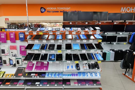 Moscow, Russia - Nov 11. 2023. monitors and tablets in DNS network store selling household appliances in the Zelenograd