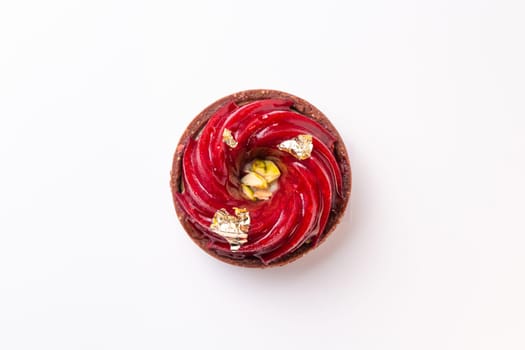 top view sweet dessert tartlet with berry jam.