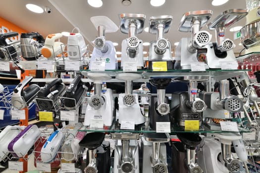 Moscow, Russia - Nov 11. 2023. electric meat grinder in DNS network store selling household appliances in the Zelenograd