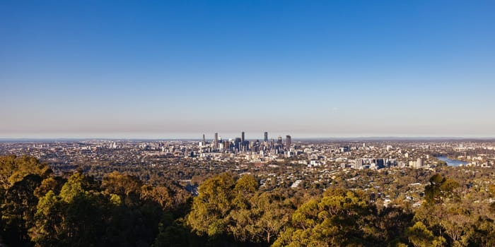 BRISBANE, AUSTRALIA - JULY 30, 2023: Brisbane skyline from Mount Coot-Tha lookout and observation deck at dusk in Brisbane, Queensland, Australia.