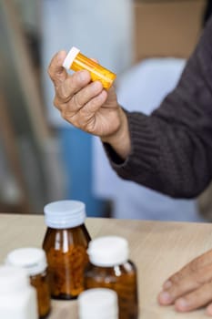 caucasian woman is sitting on prescription medication prescribed by doctor.