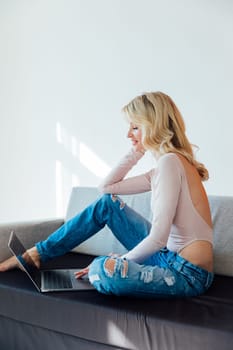 woman with computer working online from home