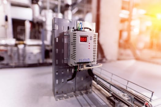 Pressure sensor in an industrial boiler room. Barometer in a heating system. Close-up.