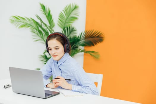woman secretary in office working online on computer