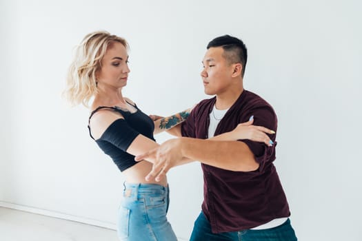a dancers man and woman bachata kizomba latina hall dance studio
