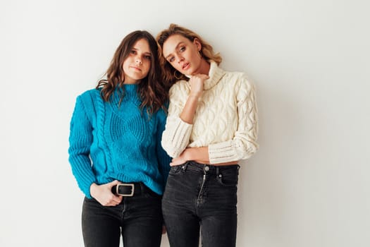 two friends in winter clothes women in sweater